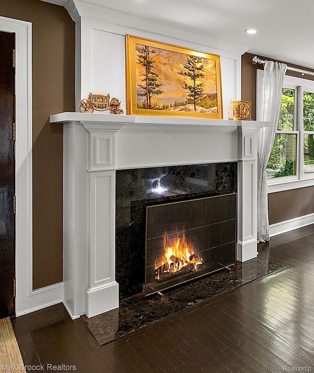 504 Landon St, Birmingham, MI 48009 - detailed view of a fireplace, wood finished floors, and recessed lighting