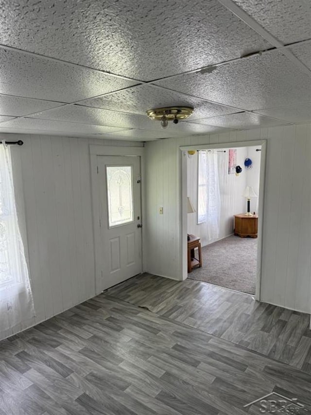 1541 Emily St, Saginaw, MI 48601 - entryway featuring wood finished floors and wooden walls