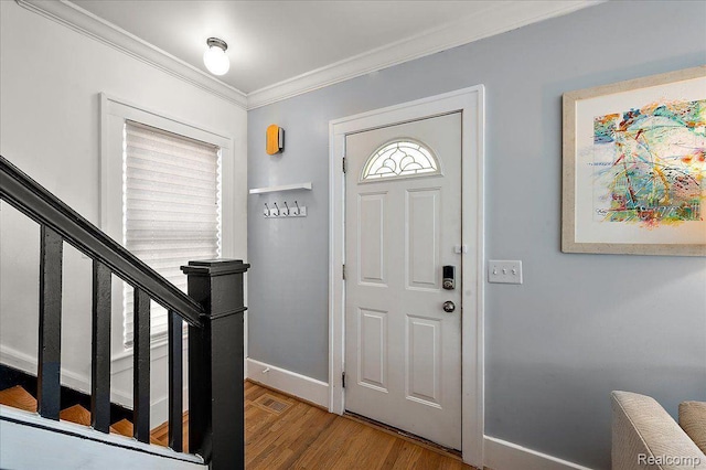 129 E Maryland Ave, Royal Oak, MI 48067 - foyer featuring crown molding, wood finished floors, and stairs