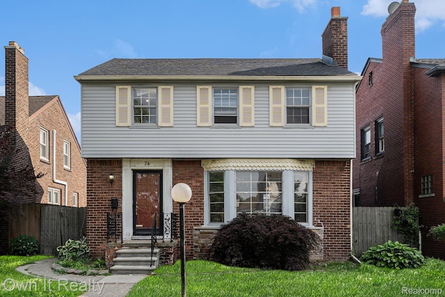 74 Chestnut St, River Rouge, MI 48218 - colonial inspired home featuring brick siding