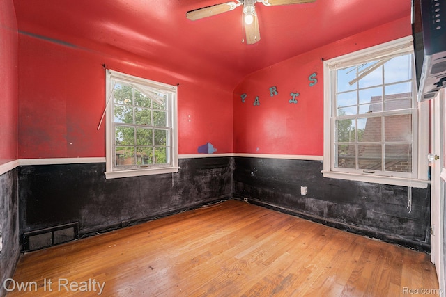 74 Chestnut St, River Rouge, MI 48218 - unfurnished room featuring wood finished floors, wainscoting, ceiling fan, and lofted ceiling