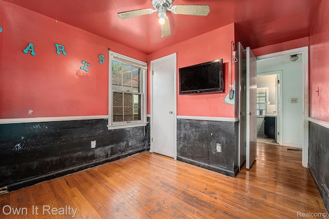 74 Chestnut St, River Rouge, MI 48218 - spare room featuring wood finished floors and a ceiling fan