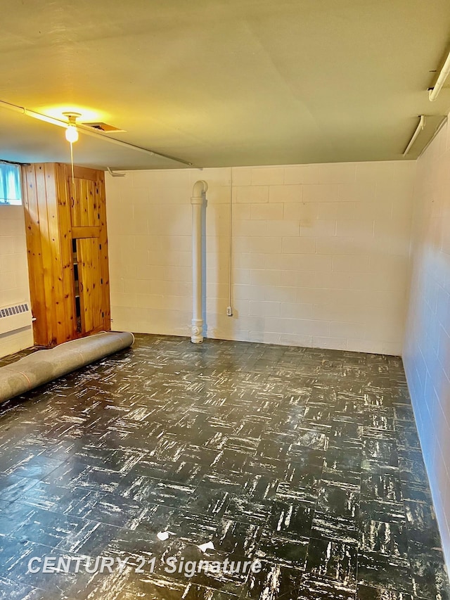 1751 Lathrup Ave, Saginaw, MI 48638 - spare room with concrete block wall