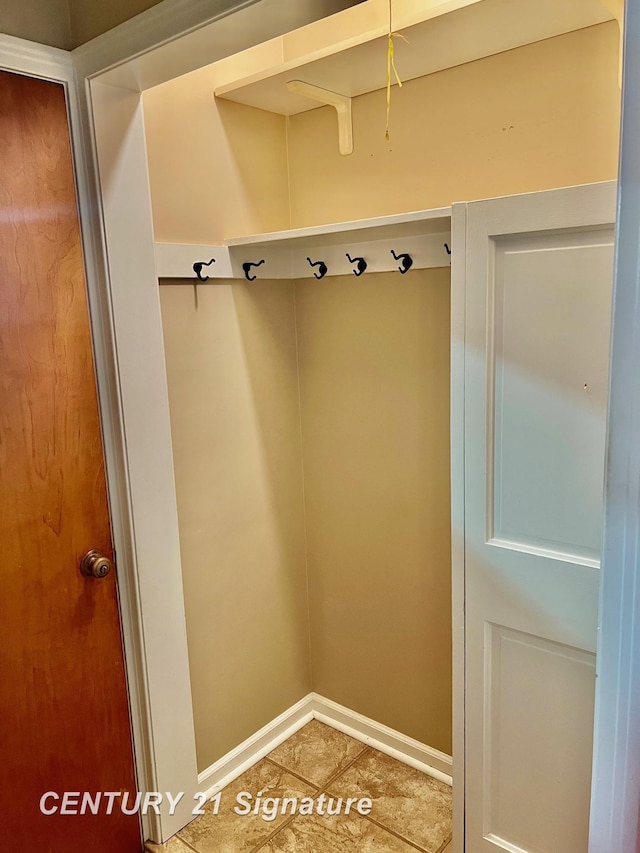 1751 Lathrup Ave, Saginaw, MI 48638 - mudroom with light tile patterned floors and baseboards