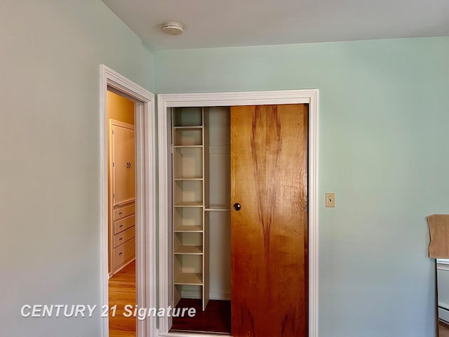 1751 Lathrup Ave, Saginaw, MI 48638 - unfurnished bedroom with a closet and wood finished floors