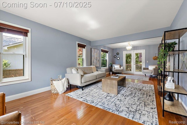 25426 Lindenwood Ln, Southfield, MI 48033 - living area featuring wood finished floors and french doors