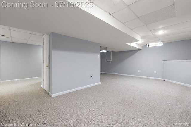 25426 Lindenwood Ln, Southfield, MI 48033 - basement featuring a paneled ceiling and carpet flooring