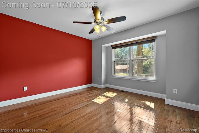 25426 Lindenwood Ln, Southfield, MI 48033 - empty room featuring a ceiling fan and wood finished floors