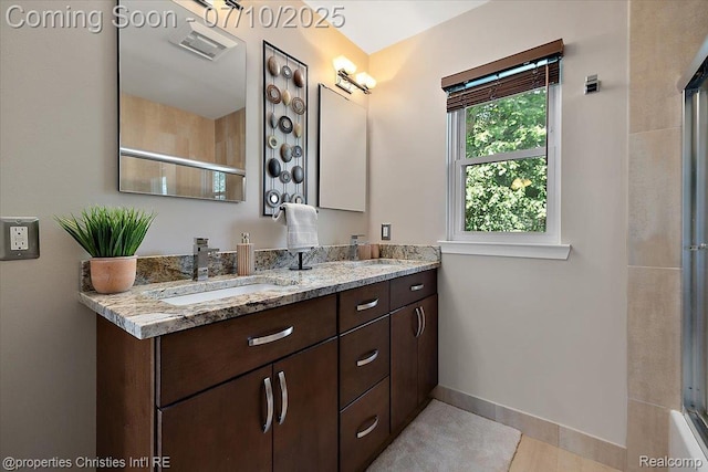 25426 Lindenwood Ln, Southfield, MI 48033 - full bathroom with double vanity and baseboards