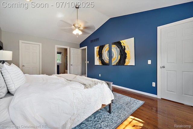 25426 Lindenwood Ln, Southfield, MI 48033 - bedroom with wood finished floors, vaulted ceiling, and a ceiling fan