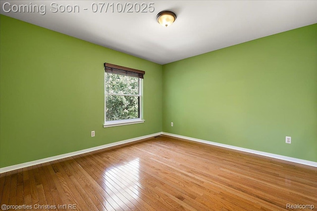 25426 Lindenwood Ln, Southfield, MI 48033 - unfurnished room featuring baseboards and wood finished floors