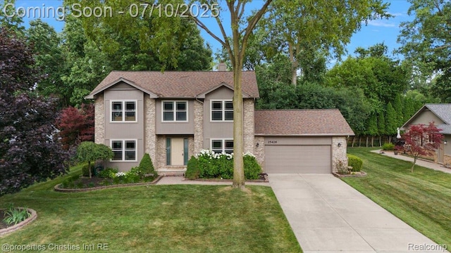 25426 Lindenwood Ln, Southfield, MI 48033 - traditional home with a garage, driveway, a front lawn, and a shingled roof