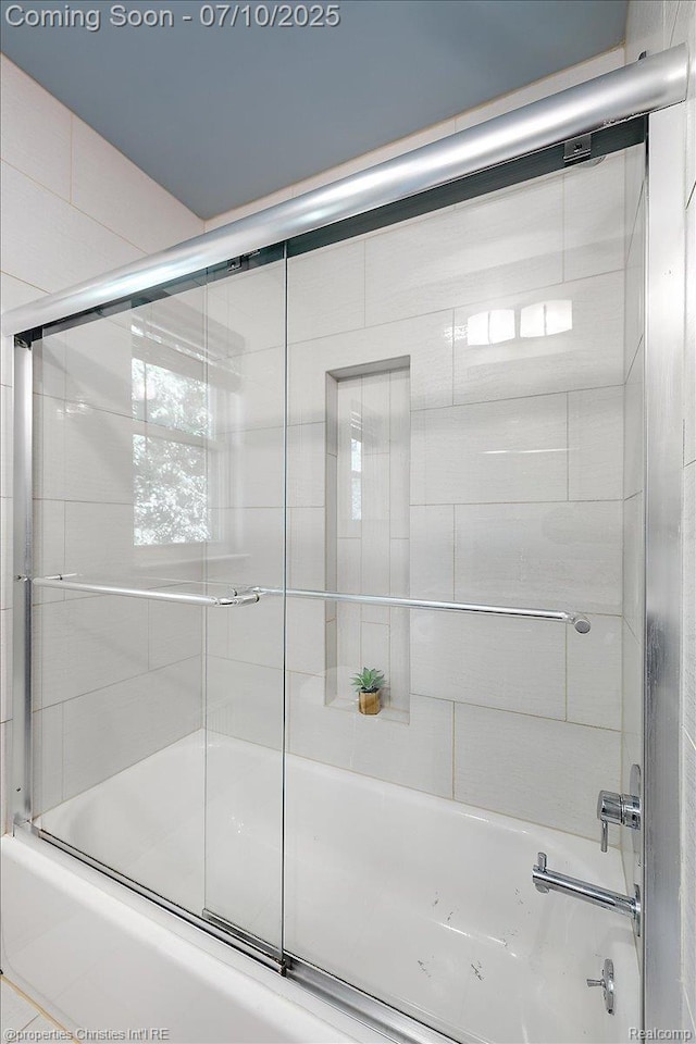 25426 Lindenwood Ln, Southfield, MI 48033 - bathroom featuring bath / shower combo with glass door and plenty of natural light