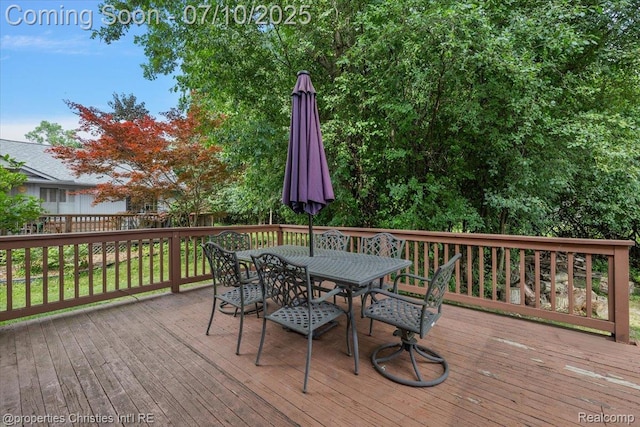25426 Lindenwood Ln, Southfield, MI 48033 - wooden deck featuring outdoor dining space and a fenced backyard