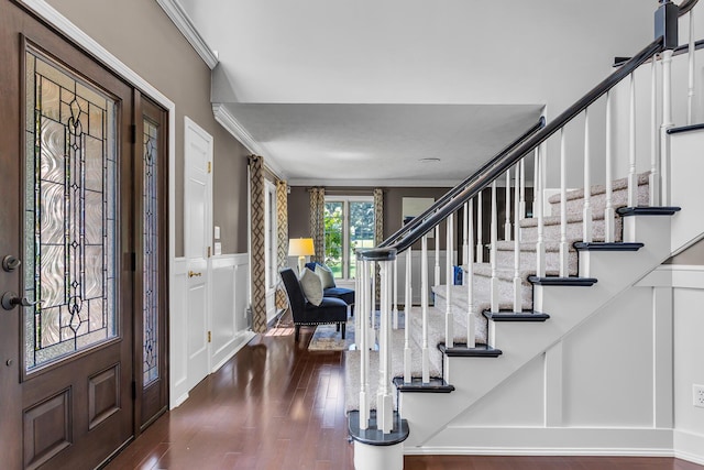 3800 Guest Rd, Jackson, MI 49203 - entrance foyer featuring wood finished floors, stairway, and crown molding