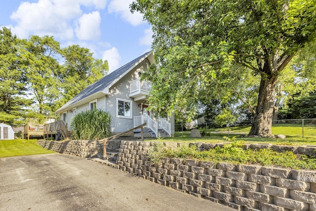 226 Briscoe Pl, Jackson, MI 49203 - view of front of house with a balcony