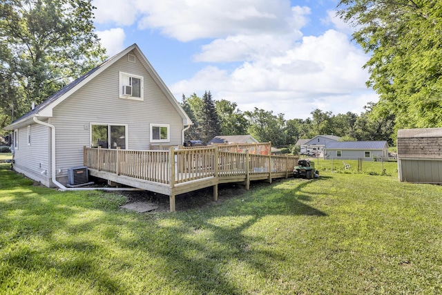 226 Briscoe Pl, Jackson, MI 49203 - rear view of house featuring a deck and a shed