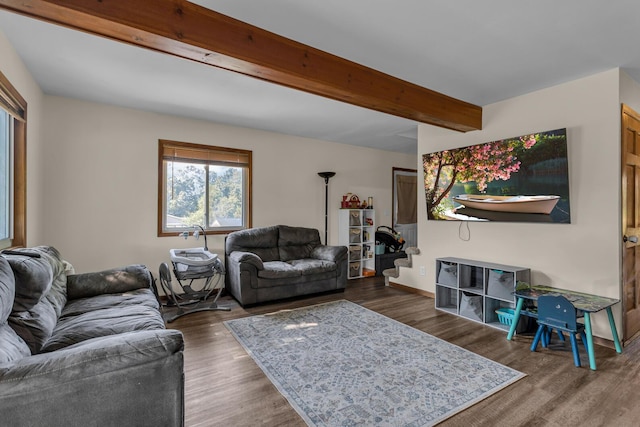 226 Briscoe Pl, Jackson, MI 49203 - living room with beam ceiling, wood finished floors, and stairway