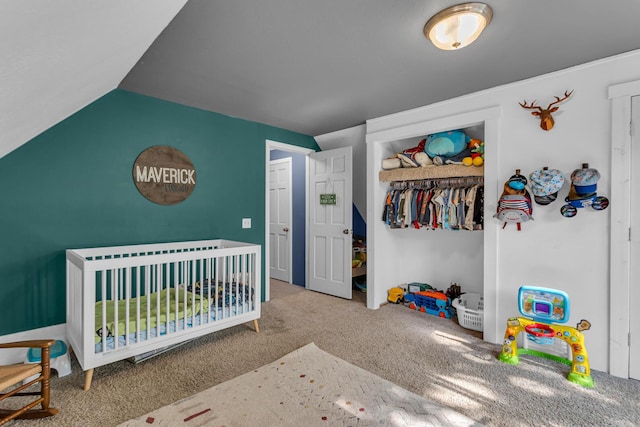 226 Briscoe Pl, Jackson, MI 49203 - carpeted bedroom with a nursery area, lofted ceiling, and a closet