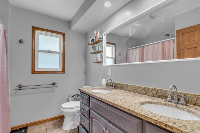 226 Briscoe Pl, Jackson, MI 49203 - bathroom featuring double vanity, tile patterned flooring, and a shower with curtain
