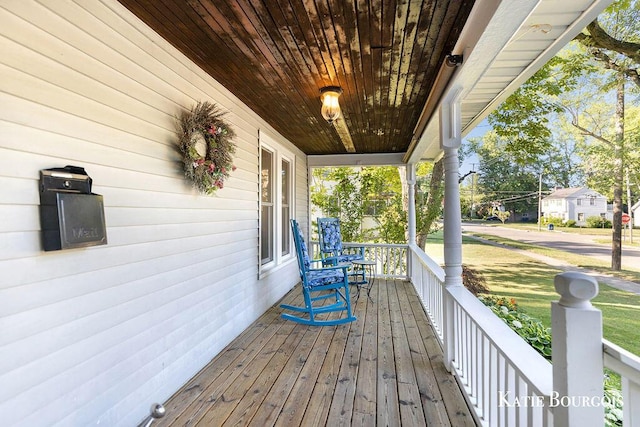 140 S Monroe St NE, Rockford, MI 49341 - view of wooden porch