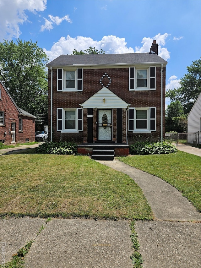 15900 Murray Hill St, Detroit, MI 48227 - townhome / multi-family property featuring brick siding and a chimney