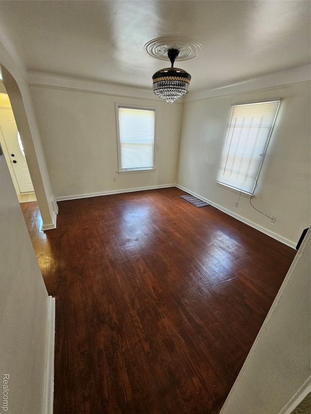 15900 Murray Hill St, Detroit, MI 48227 - unfurnished room with arched walkways and wood finished floors