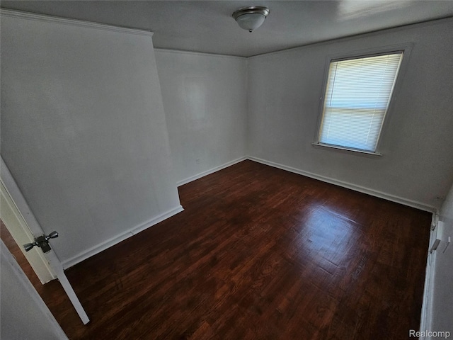 15900 Murray Hill St, Detroit, MI 48227 - spare room featuring dark wood finished floors and baseboards