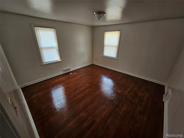15900 Murray Hill St, Detroit, MI 48227 - unfurnished room with dark wood finished floors and baseboards