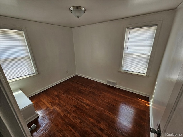 15900 Murray Hill St, Detroit, MI 48227 - spare room featuring dark wood-type flooring and baseboards