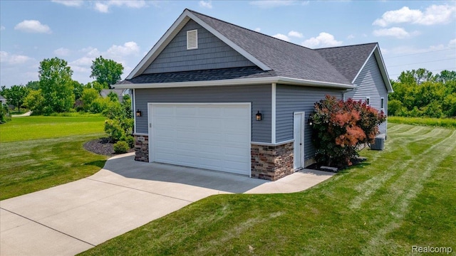 5606 Chatham Ln, Grand Blanc, MI 48439 - view of property exterior with a yard, roof with shingles, stone siding, and a detached garage