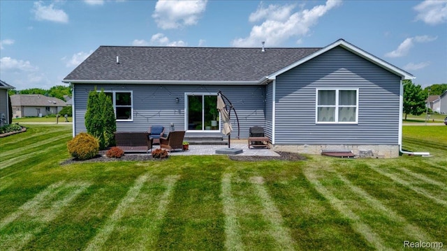 5606 Chatham Ln, Grand Blanc, MI 48439 - rear view of property with a patio area, a yard, and roof with shingles