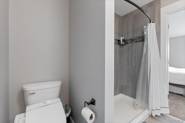 5606 Chatham Ln, Grand Blanc, MI 48439 - bathroom with toilet and a stall shower