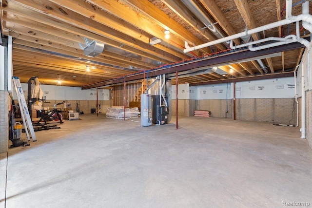 5606 Chatham Ln, Grand Blanc, MI 48439 - unfinished below grade area with gas water heater and heating unit