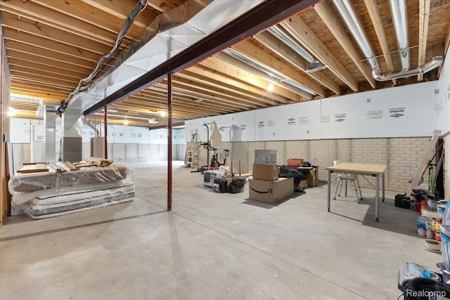 5606 Chatham Ln, Grand Blanc, MI 48439 - unfinished basement featuring brick wall