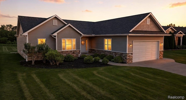 5606 Chatham Ln, Grand Blanc, MI 48439 - craftsman inspired home featuring driveway, a garage, a front lawn, and stone siding