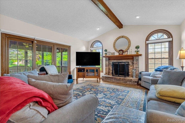 24842 White Plains Dr, Novi, MI 48374 - living room featuring a textured ceiling, wood finished floors, a fireplace, and recessed lighting