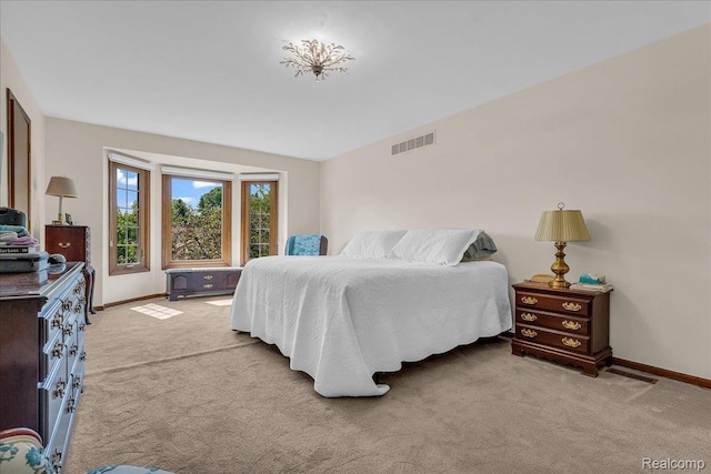 24842 White Plains Dr, Novi, MI 48374 - bedroom featuring light carpet and baseboards