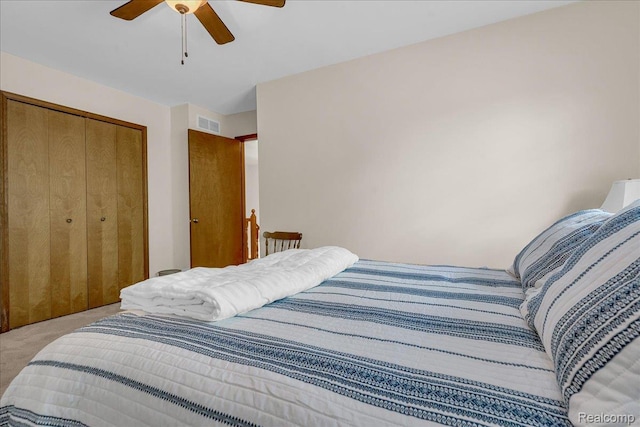 24842 White Plains Dr, Novi, MI 48374 - bedroom with light carpet, a closet, and a ceiling fan