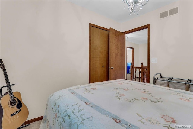 24842 White Plains Dr, Novi, MI 48374 - bedroom with a chandelier and a closet
