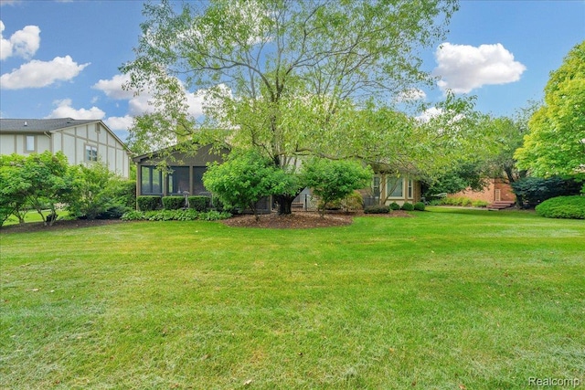 24842 White Plains Dr, Novi, MI 48374 - view of green lawn featuring a sunroom