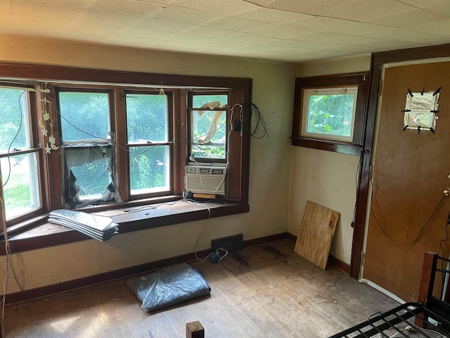4120 S Washington Rd, Saginaw, MI 48601 - entrance foyer with wood finished floors, plenty of natural light, and cooling unit