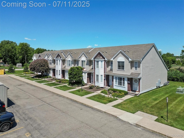 35033 Windsor Dr, New Baltimore, MI 48047 - view of property with a front yard and a residential view
