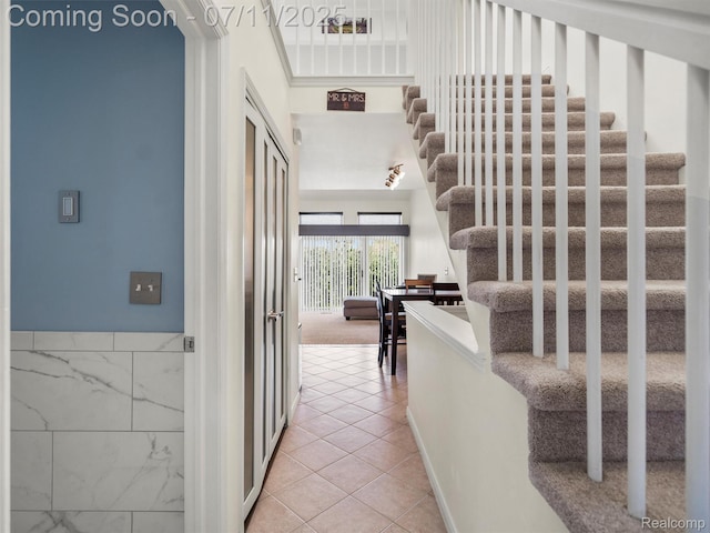 35033 Windsor Dr, New Baltimore, MI 48047 - hall featuring stairs and light tile patterned flooring