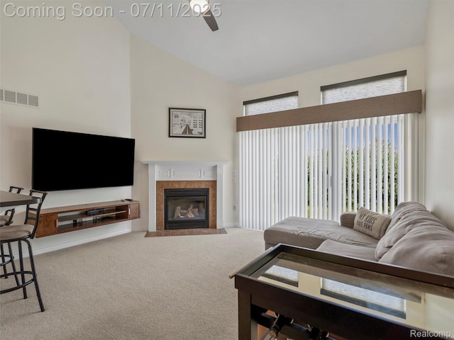 35033 Windsor Dr, New Baltimore, MI 48047 - carpeted living room with ceiling fan, a fireplace, and high vaulted ceiling
