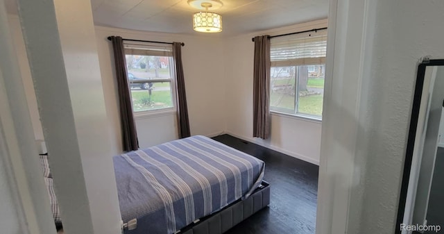 1644 Marylestone Dr, West Bloomfield, MI 48324 - bedroom with dark wood-style flooring and baseboards