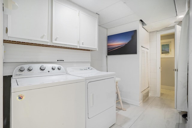 6881 Helena St, West Olive, MI 49460 - laundry room featuring washer and clothes dryer and cabinet space