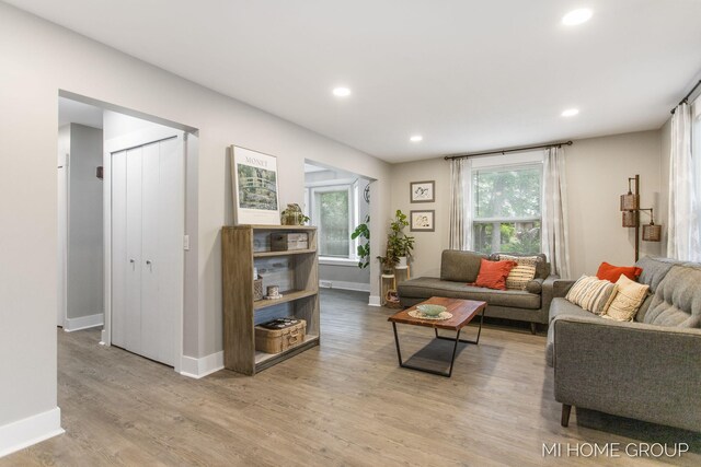 3255 Prairie St SW, Grandville, MI 49418 - living area featuring wood finished floors and recessed lighting