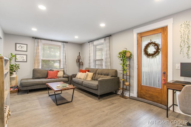 3255 Prairie St SW, Grandville, MI 49418 - living area featuring light wood finished floors and recessed lighting