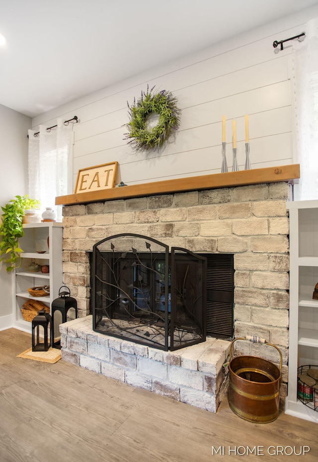 3255 Prairie St SW, Grandville, MI 49418 - detailed view of a fireplace and wood finished floors